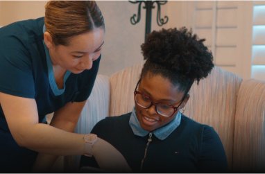 dental specialist explaining to a patient the results of her dental evaluation in San Diego My Smile