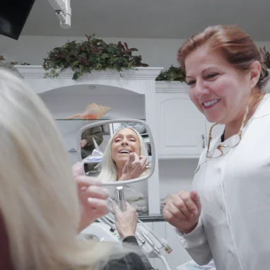 Dr.Irma Gavaldón attending to a patient during a professional emergency dentistry consultation
