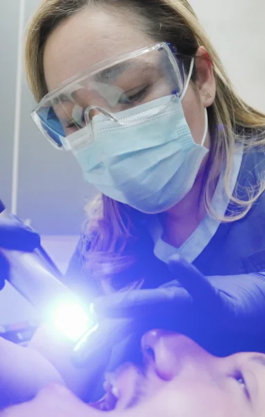 dental specialist performing treatment process to patient at dental expressions